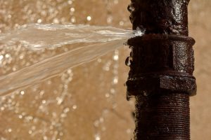 a pipe with a pinhole leak 