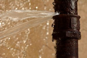 brown-pipe-springing-leak