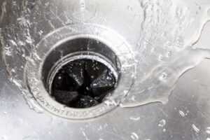 sink-drain-with-water-flowing-down
